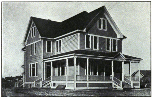 A black and white photo of a house

Description automatically generated with medium confidence