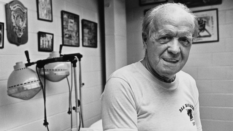 Jock Semple smiling in a room