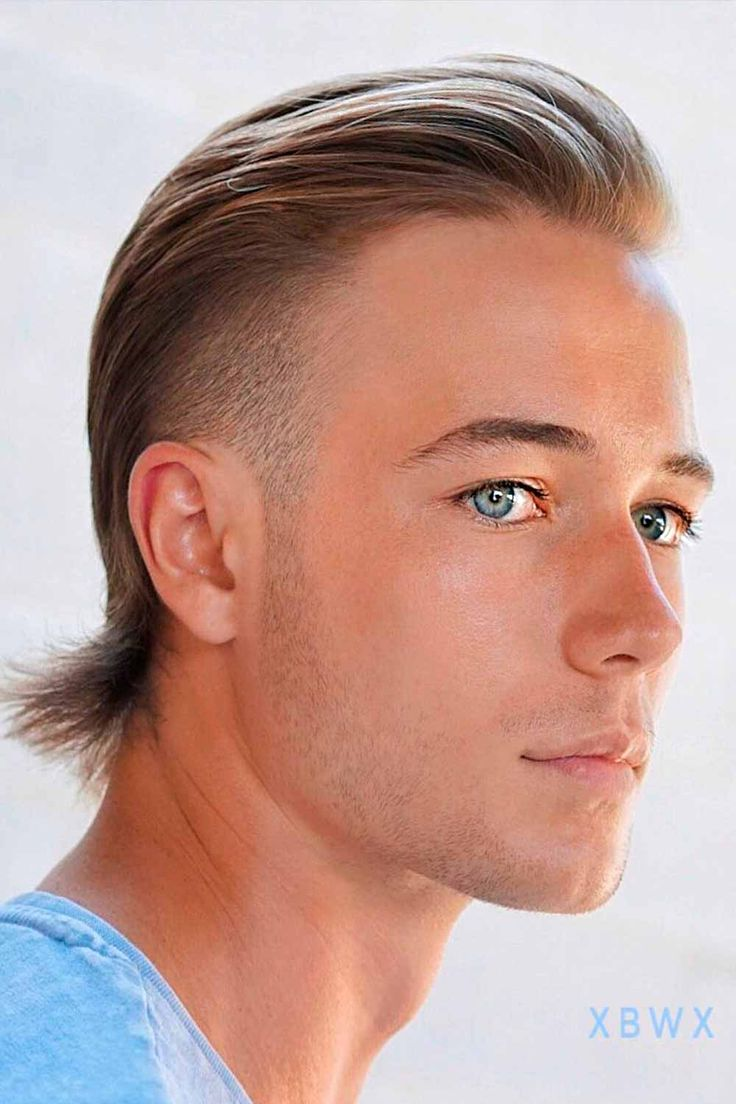 Another picture of a guy rocking the slicked burst fade mullet