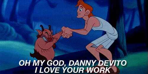Hercules from Disney's Hercules shaking Phil's hand saying "Oh my God, Danny DeVito I Love Your Work"