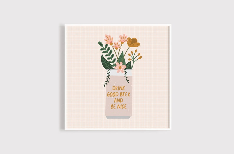 A photo of a framed art print.  It features a light pink beer can that says 'drink good beer and be nice' and is full of pink, yellow and green flowers and leaves. 