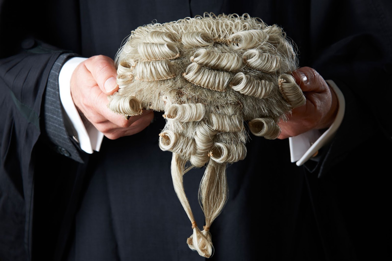 "Barrister holding wig"