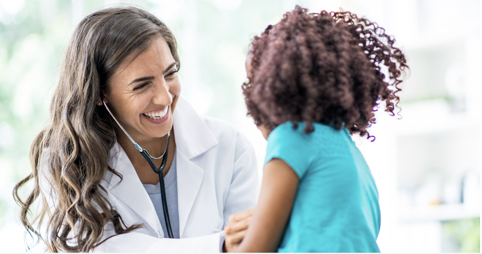 Pediatrician with patient