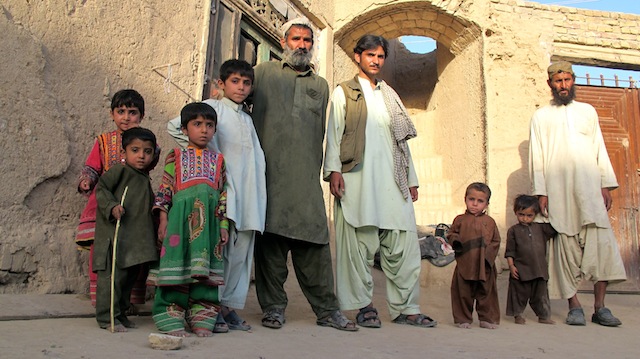 A Baloch family from the Taliban-stronghold of Kandahar stand for a photograph. While millions of Afghans have fled to Pakistan over the past four decades, Pakistani Balochs are taking the opposite route, fleeing to Afghanistan to avoid repression by the Pakistani government. Credit: Karlos Zurutuza/IPS