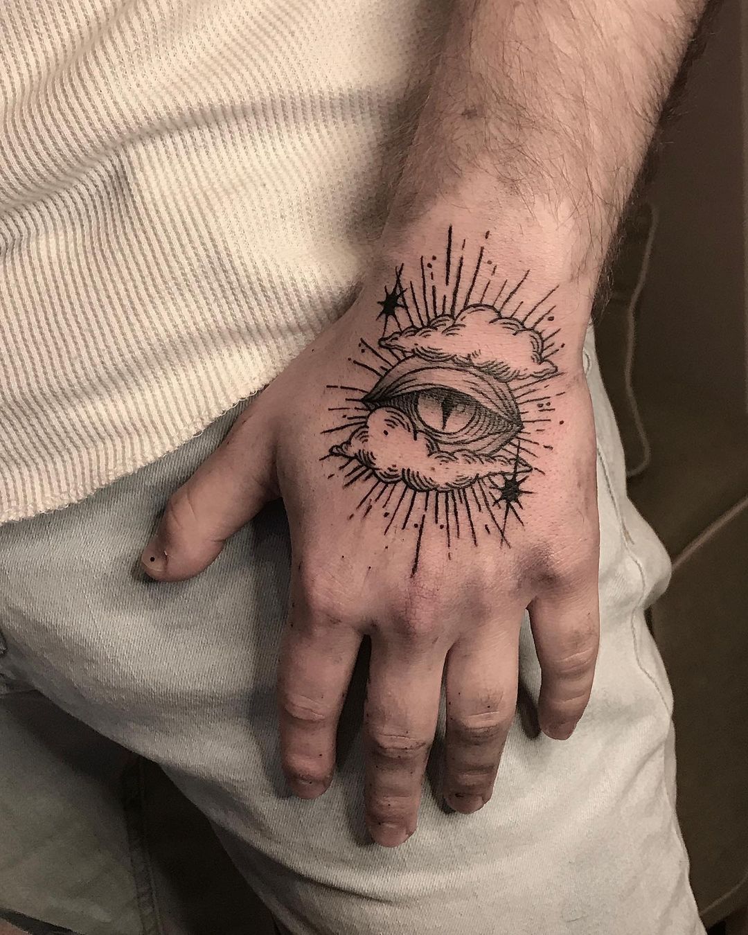 Cloudy Eye Tattoo Design On Hand