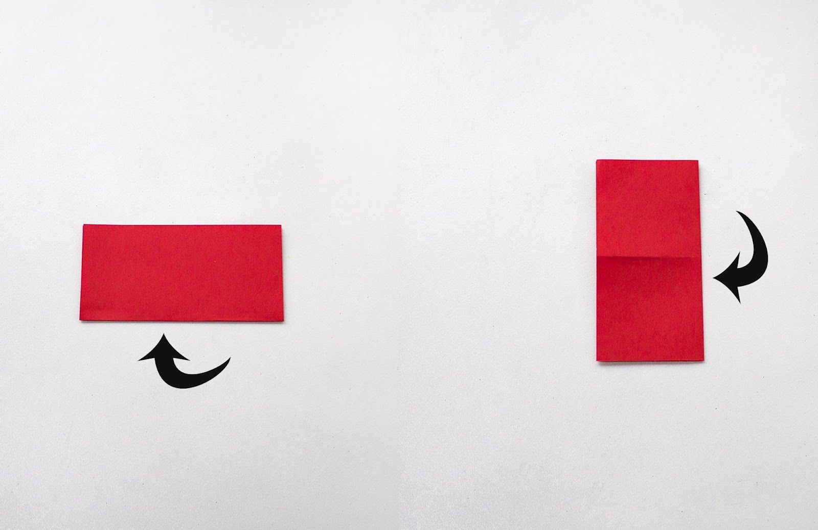 Red sheet of paper folded in half twice