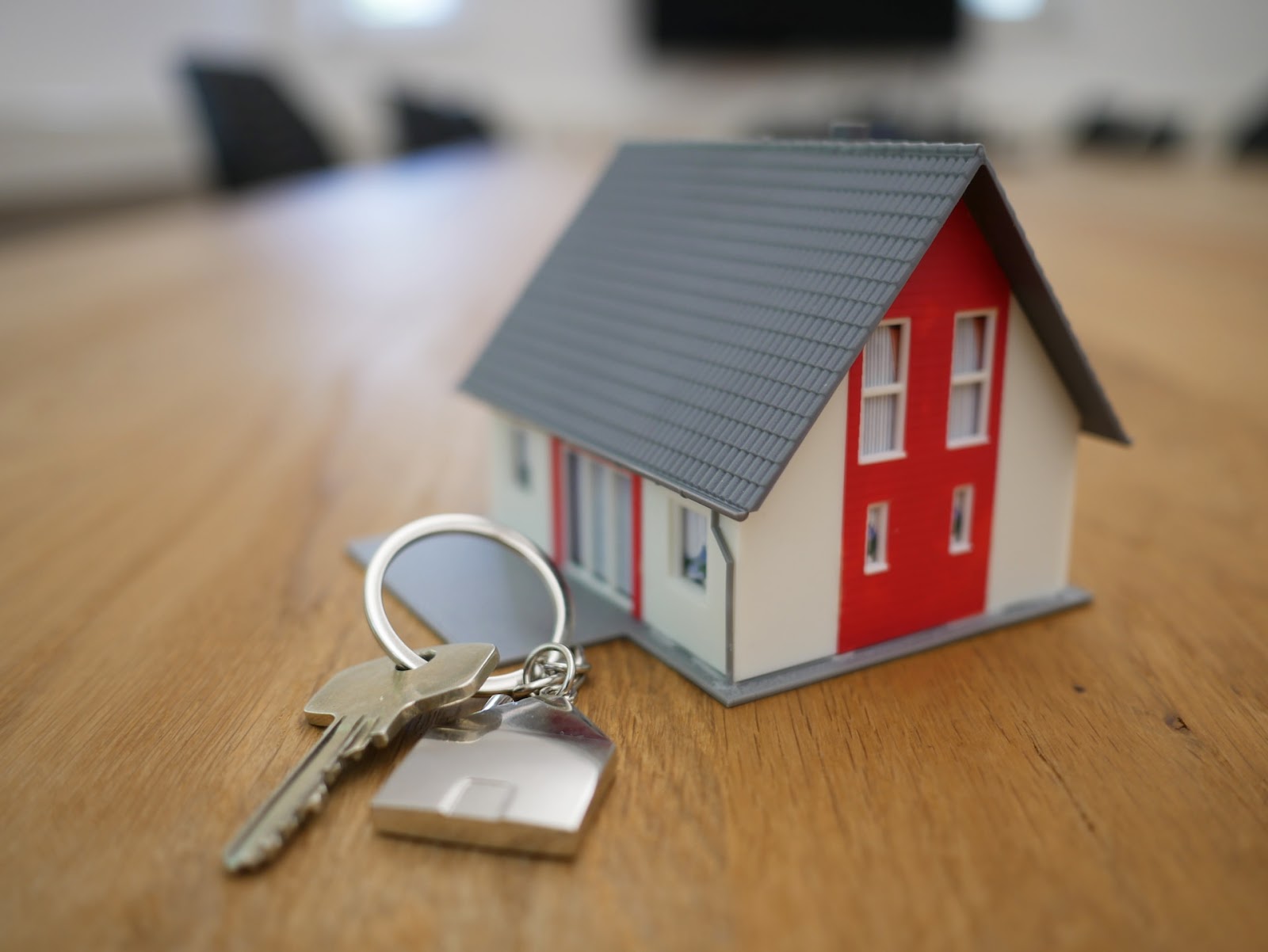 a key and a house model