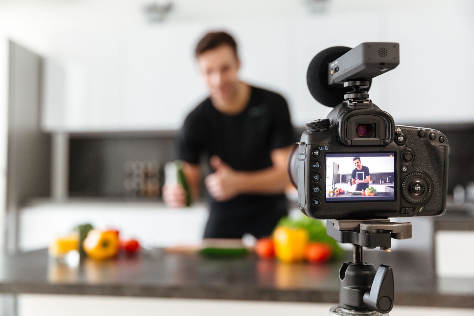 A Home-based content creator standing in front of a camera