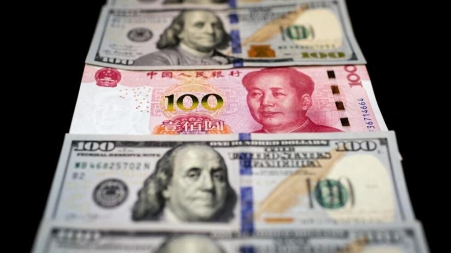 Hình inh họa: Đồng đô la Mỹ và nhân dân tệ Trung Quốc.