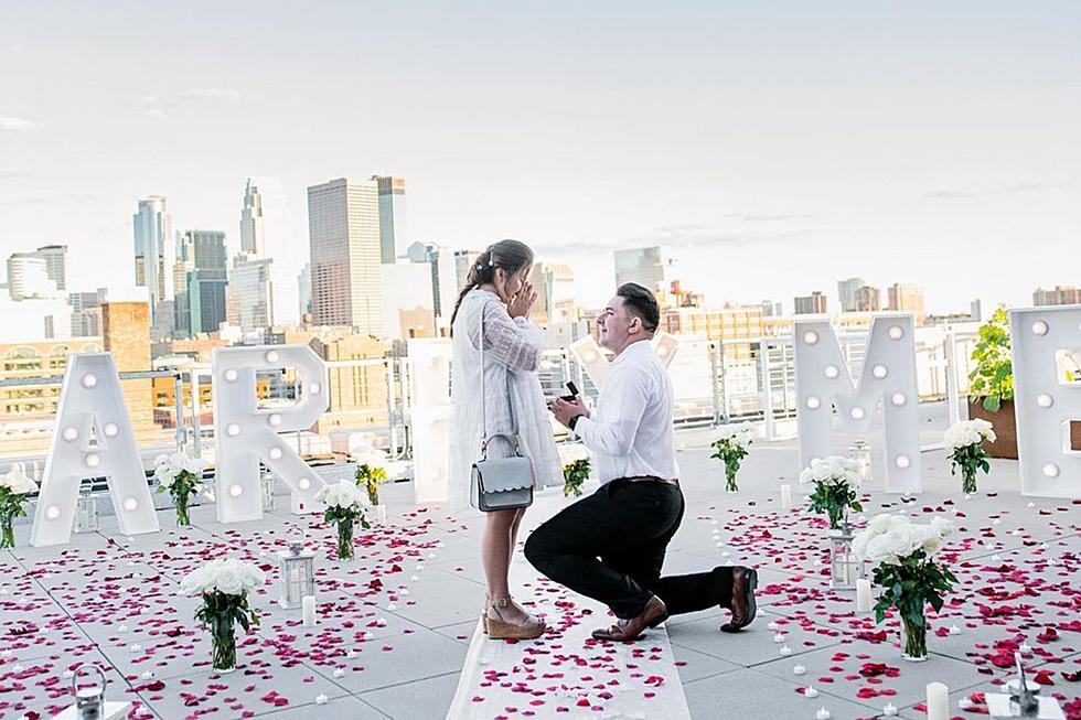 intimate proposal on a rooftop