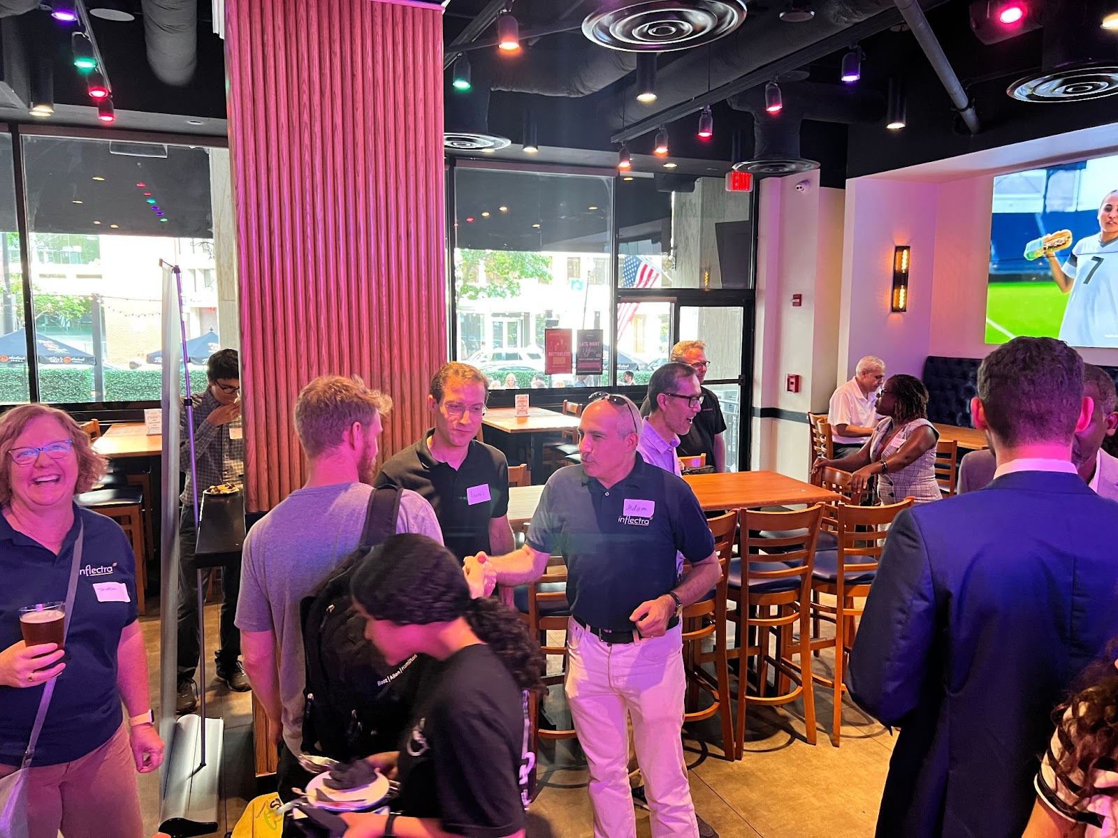 attendees-conversing-at-the-admiral-in-dupont-washington-dc-for-inflectra-happy-hour-meetup-image