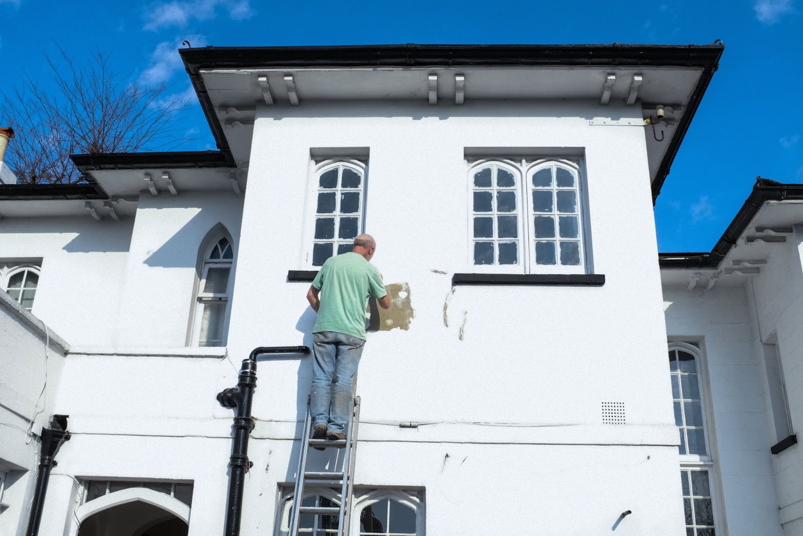 how to paint stucco