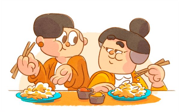Desenho dos personagens do Duolingo Lucy e Lin, que são avó e neta, sentadas juntas em uma mesa. Elas estão se olhando, ambas com pauzinhos japoneses nas mãos e comendo em pratos cheios de comida.