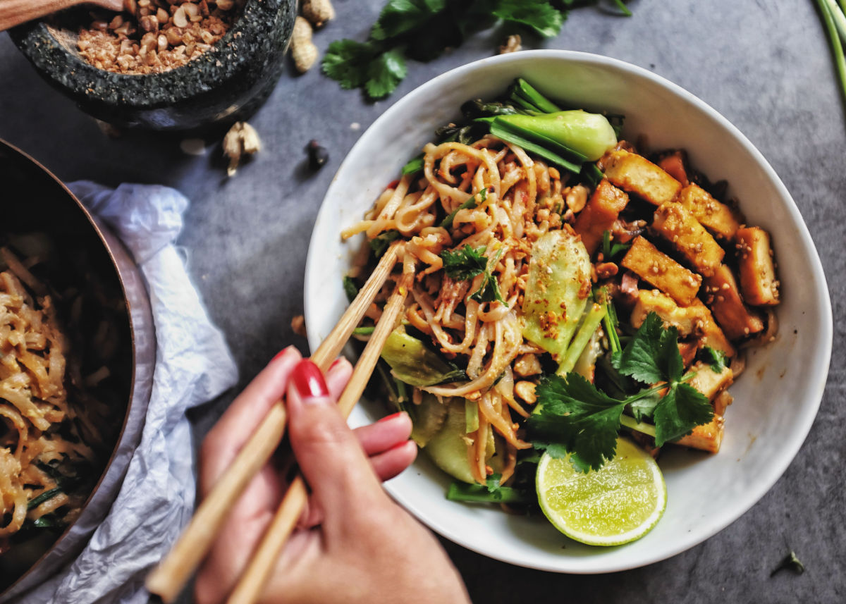 Vegan pad thai with smoked tofu and mixed vegetables