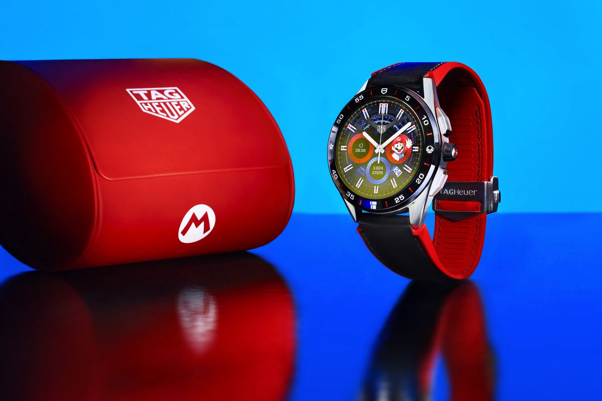 An image of a watch with red band and watch case. it’s a really nice Mario watch!