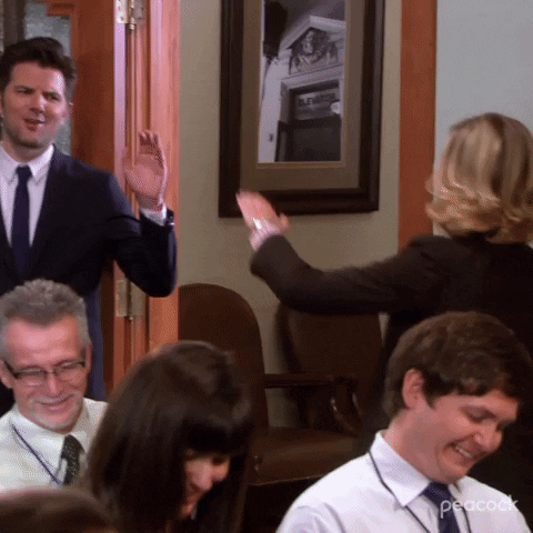 Integrated Project Management: Parks and Recreation characters high-fiving