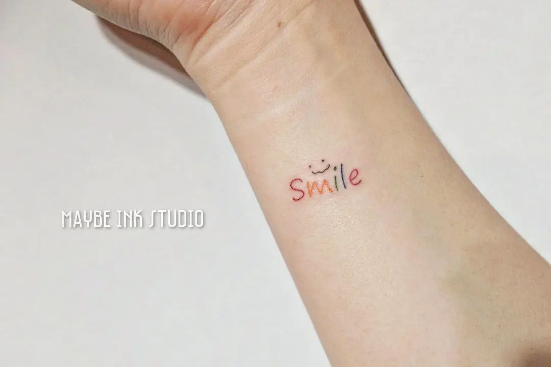 Colored Smile Wrist Tattoo Design