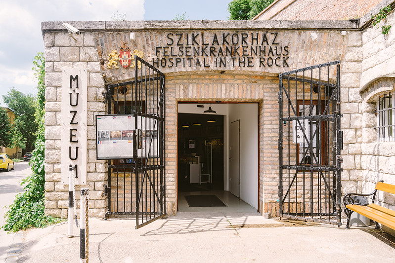 The small and gated entrance to the Hospital in the Rock