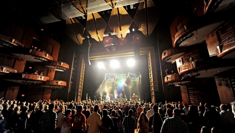 An audience watches a live performance at Cobb Energy Performing Arts Centre in Smyrna, GA.