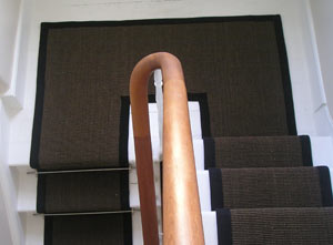 sisal staircase runner in a rectangular landing.jpg
