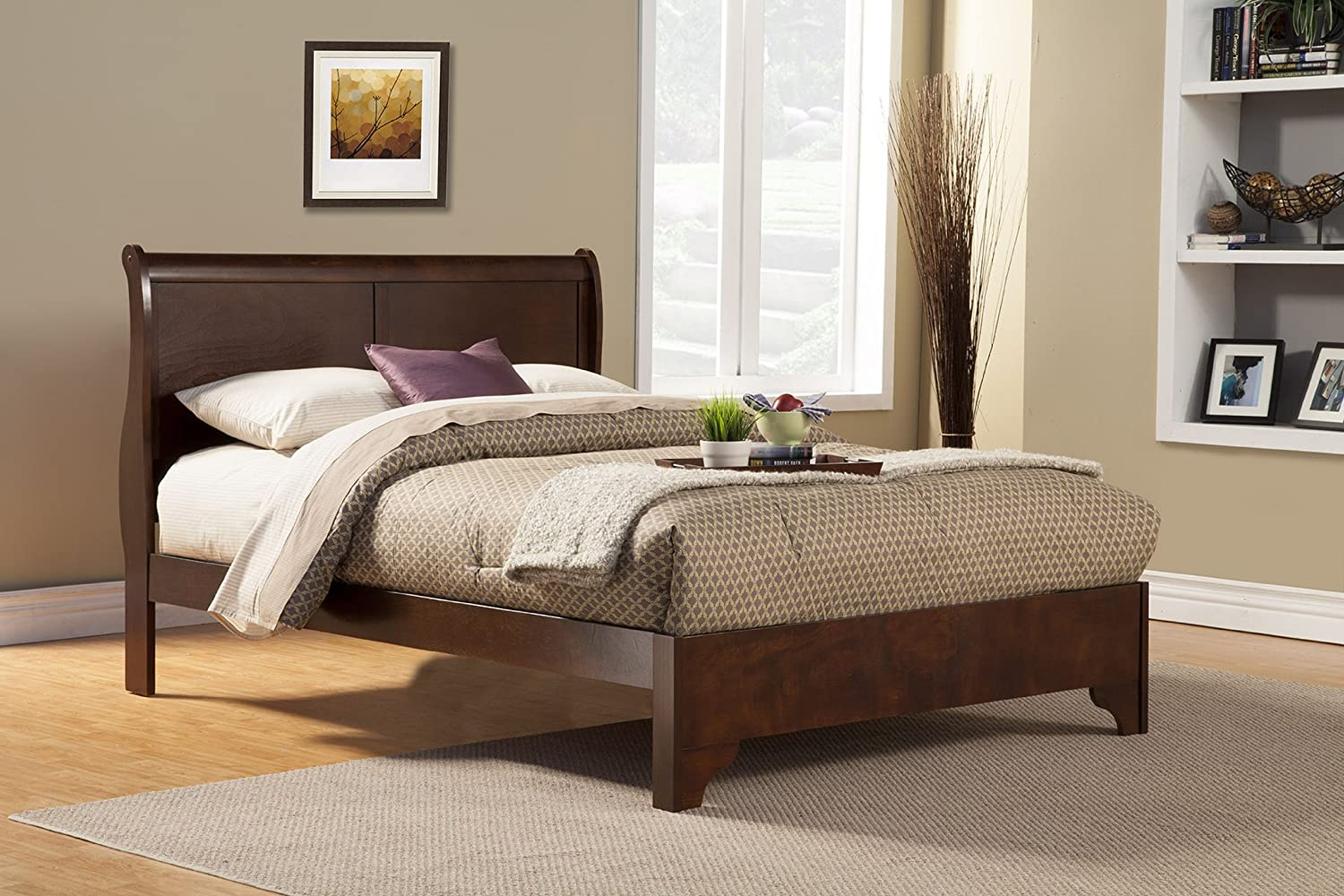 A low footboard sleigh bed provides a traditional look blended with a modern design.