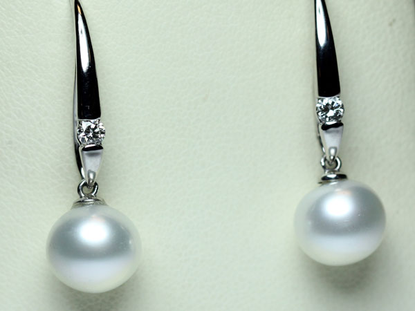 pearl and diamond dangling earrings