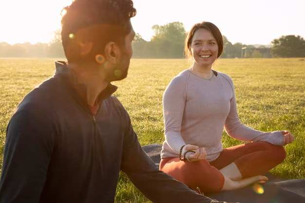 men and women doing mindful meditation