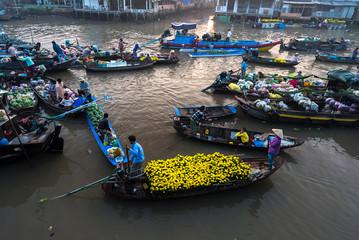 Farmers purchase crowded in Phong Dien floating market morning with dozens boats along river trade agricultural products serves traditional in Can Tho, Vietnam
                        