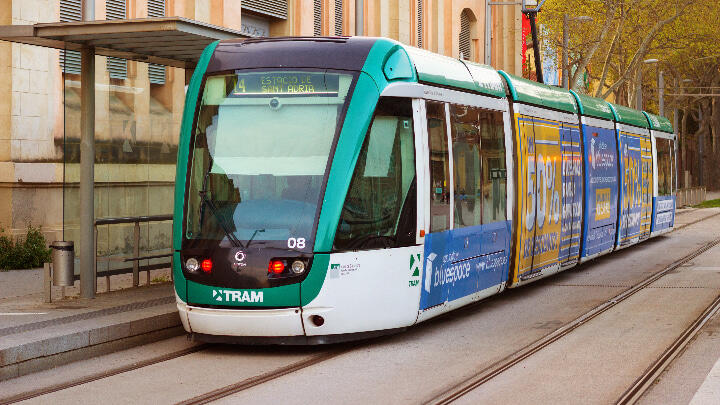 A stationary tram at a tram stop