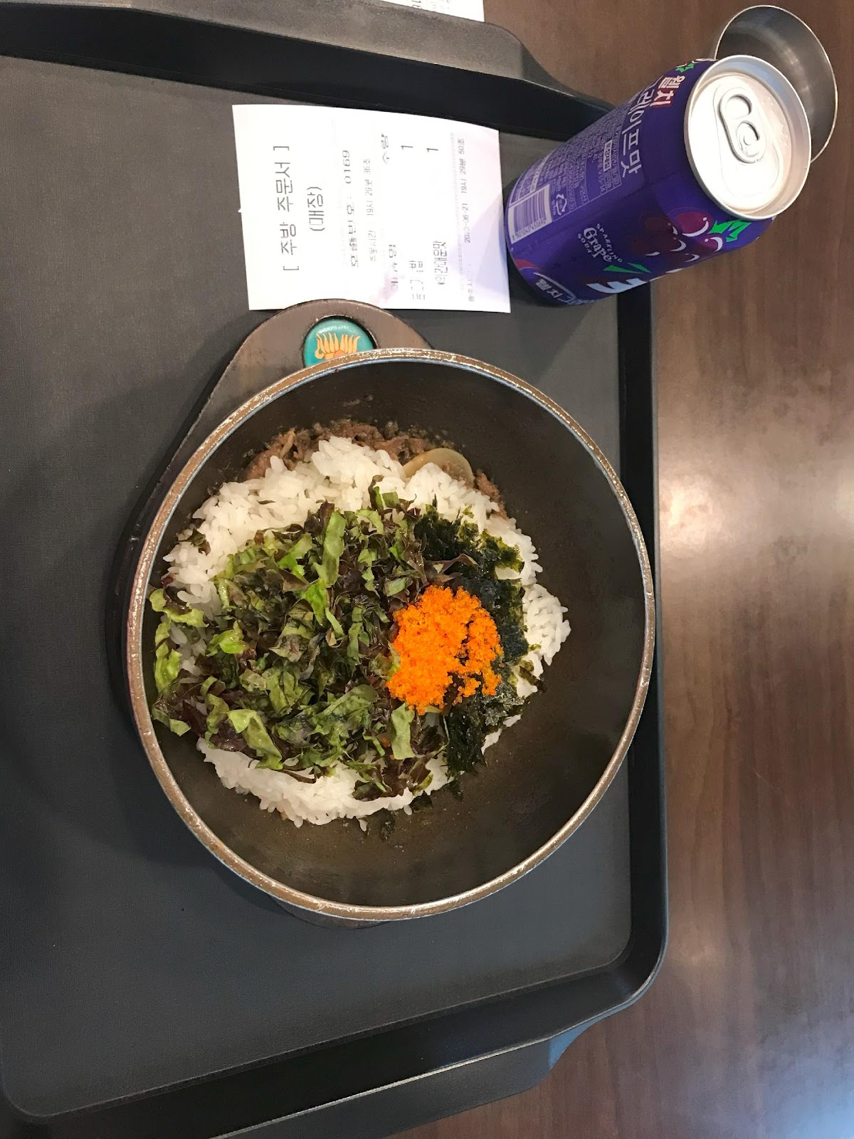 A bowl of rice and vegetables on a tray

Description automatically generated with low confidence
