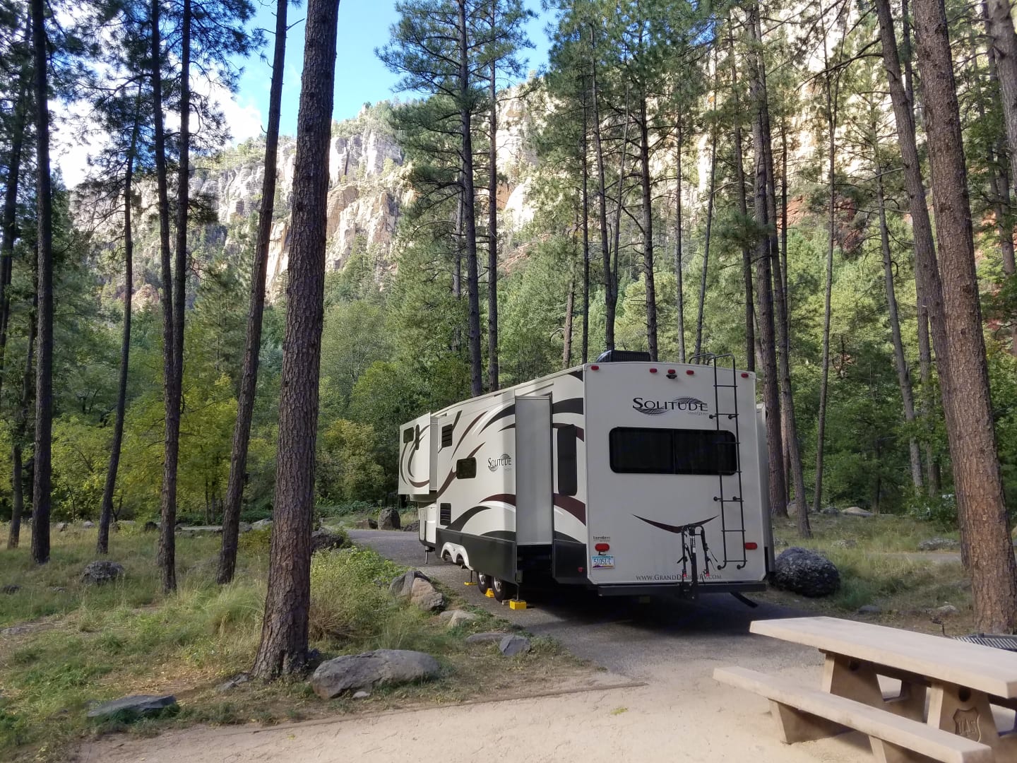 Fifth-wheel RV in the woods