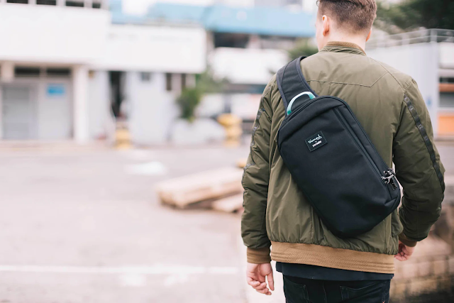 person use slingbag