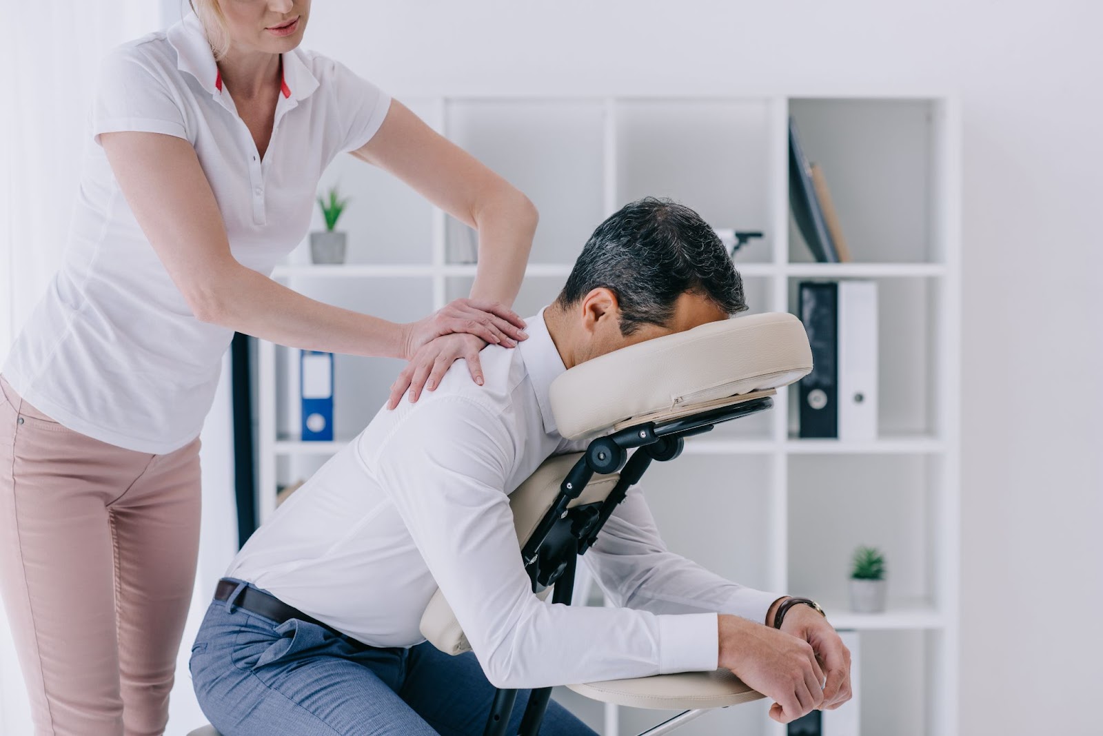 company holiday party ideas: corporate massage for employees
