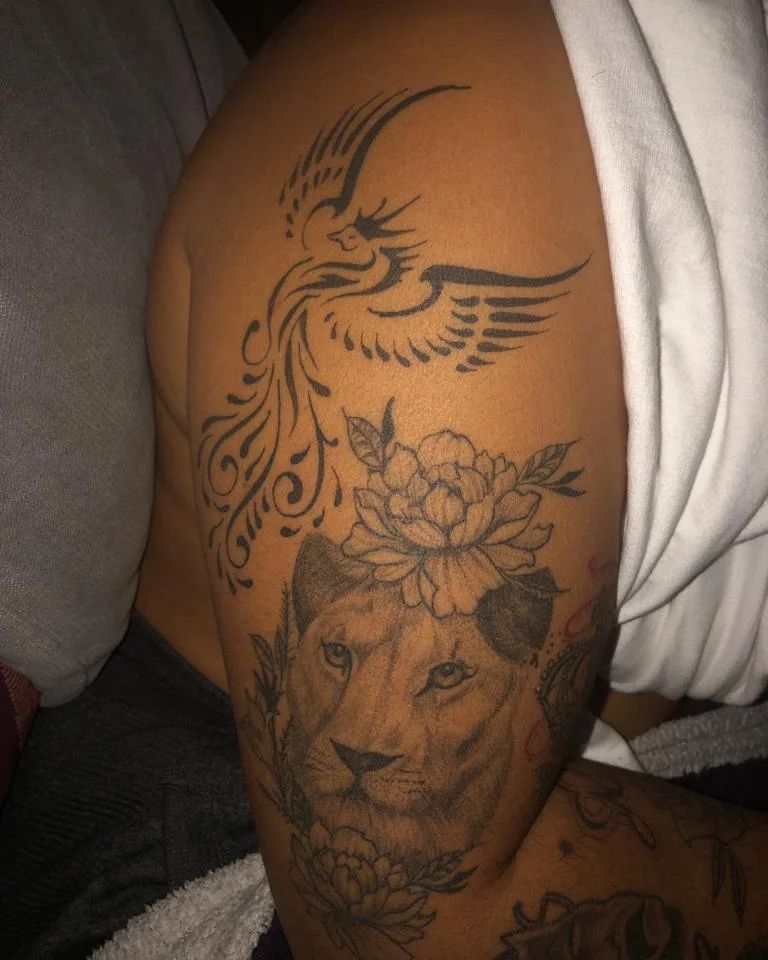 Lion And Phoenix Tattoo