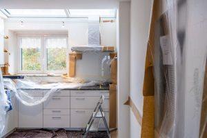 A kitchen where the countertops are being renovated.