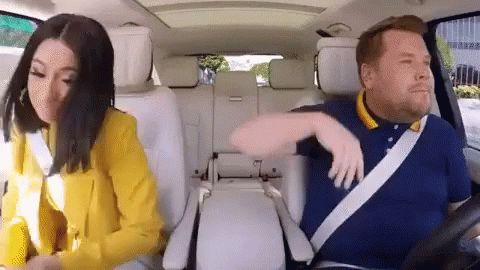 gif cardi b and james corden singing along to music in the car during the feature 'carpool karaoke'