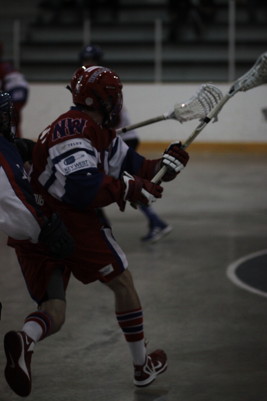 Chet Koneczny pro lacrosse player performing a face-dodge, showing good ball protection using a dodge technique