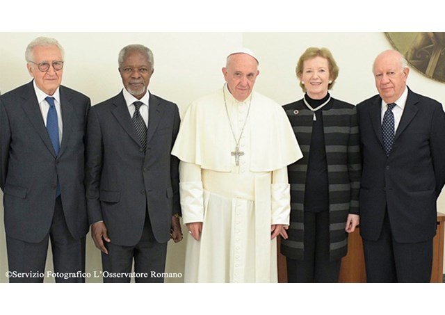 Mary Robinson stands beside Pope Francis with other members of The Elders during an audience at the Casa Santa Marta on Monday - RV