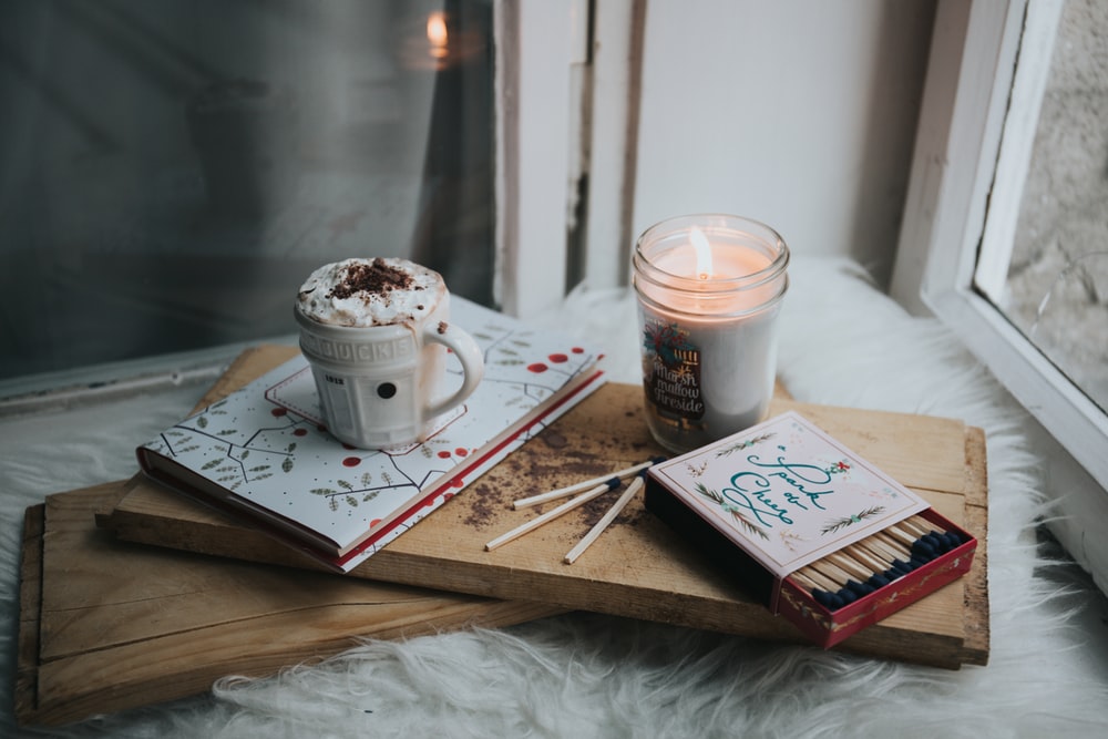 white ceramic mug on brown tray