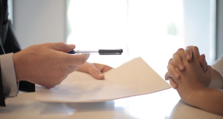 two people negotiating a contract