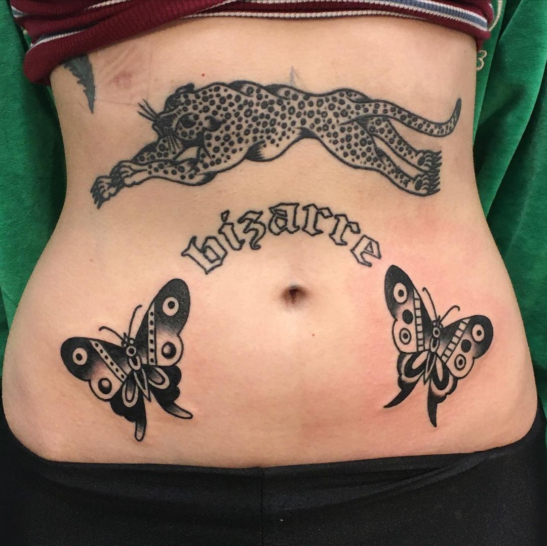 Butterfly With Leopard Tattoo