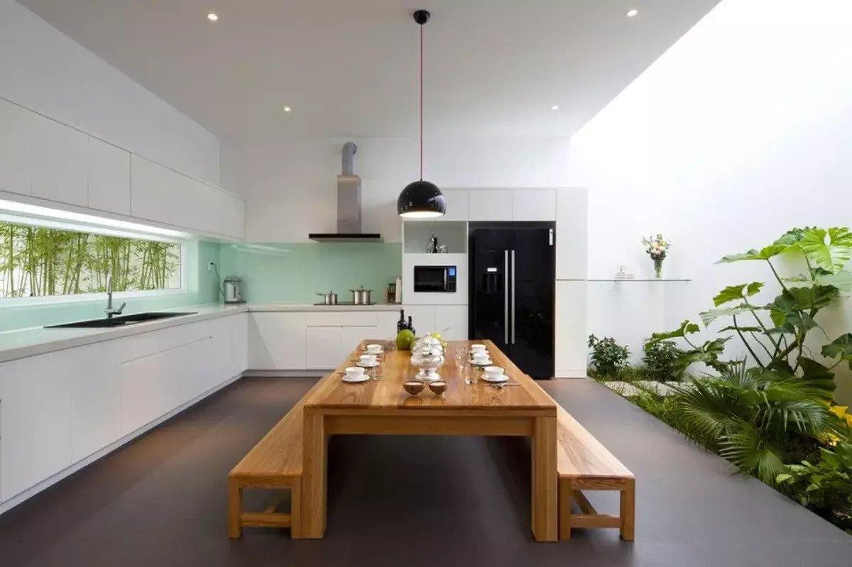 Desain Dapur dan Ruang Makan Terbuka Futuristik Namun Alami