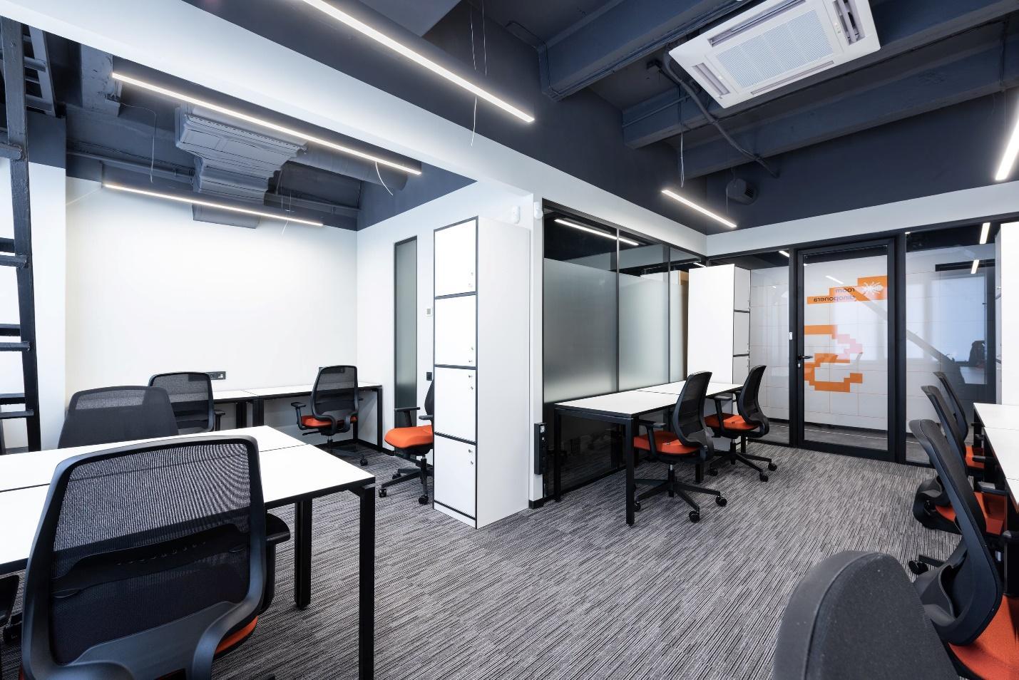 Open space office with tables and chairs