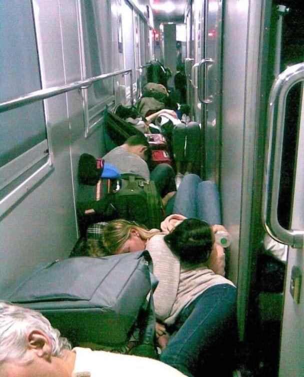 People sleeping on a train

Description automatically generated with low confidence