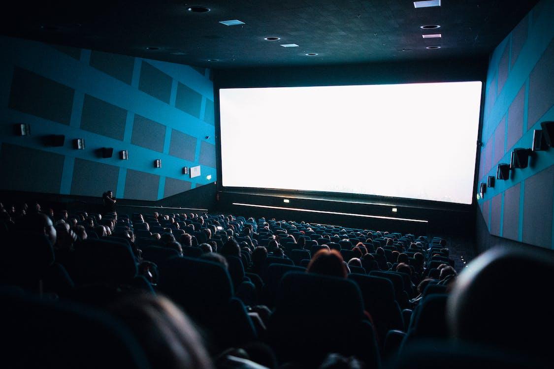 Free High-Angle Shot of People Watching Movie Inside the Theater Stock Photo