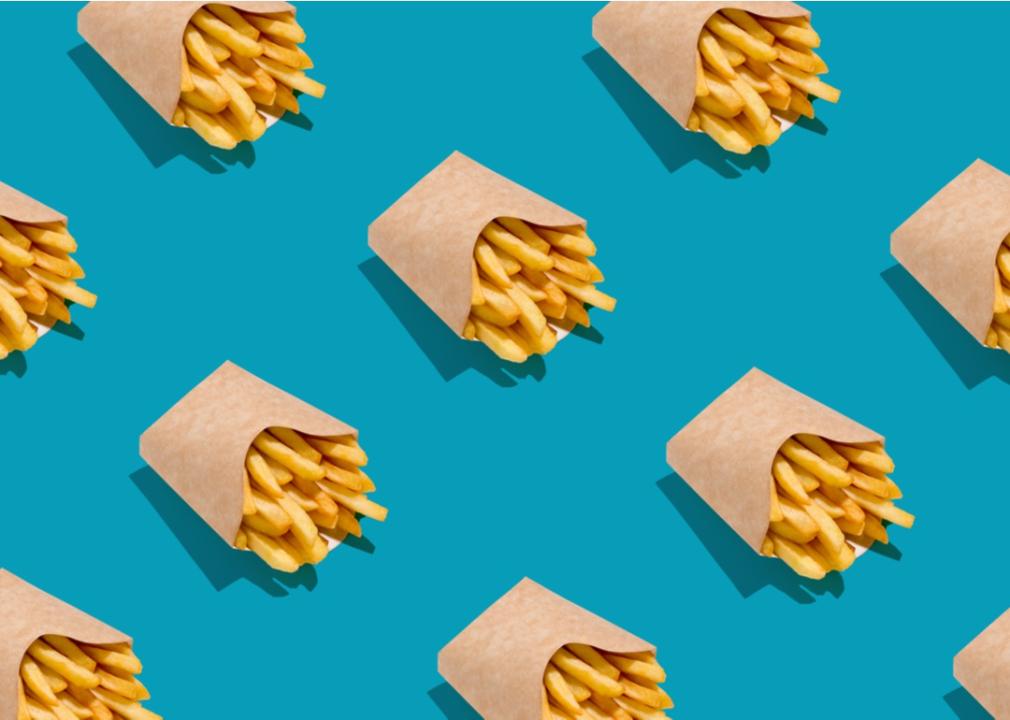Print of boxes of french fries on a blue background.
