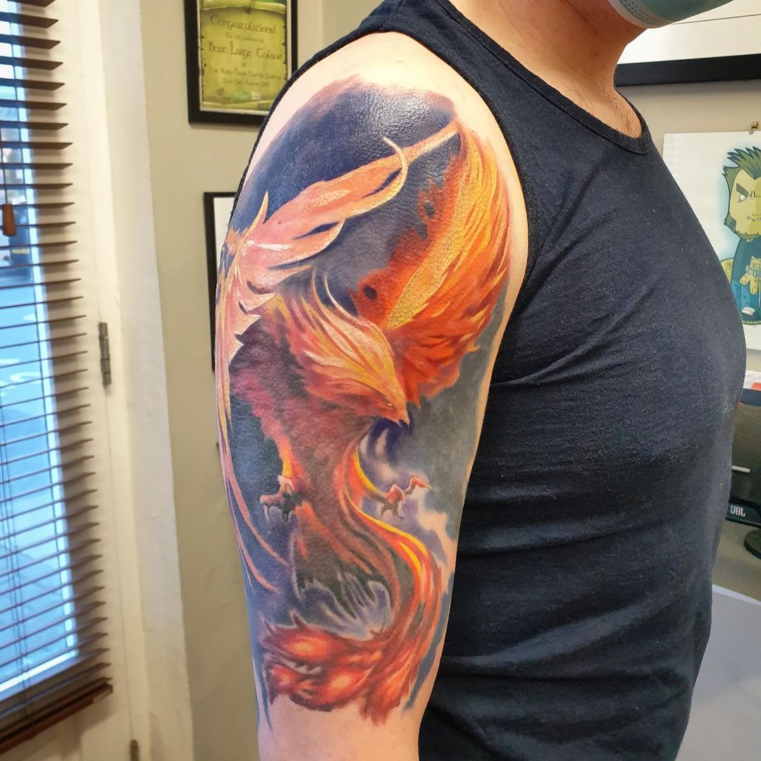 Stunning Half-sleeve Phoenix Tattoo