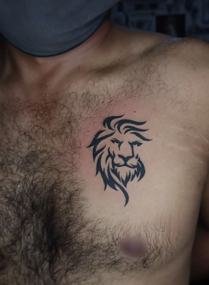 Lion And Tribal Tattoo Idea For Chest