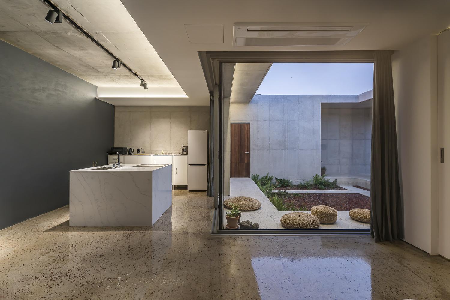 Concrete House With Patio Style Courtyard