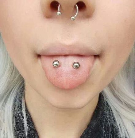 Full picture of a lady rocking her piercing with style